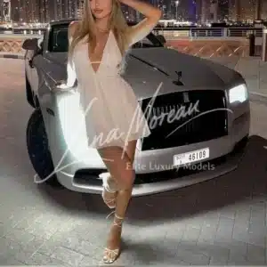 Elegant escort Alexandra in white dress