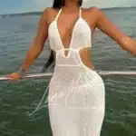 Elegant escort Hongkong in white crochet dress