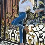 Stylish blonde Model in skinny jeans