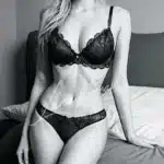 Refined black lingerie companion pose