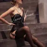 High class lingerie model with pearls on stairs – elite escort in Brussels