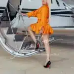 Escort Lady Boarding private jet in heels