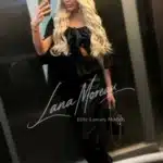 Exclusive blonde Escort Lady taking mirror selfie Vienna