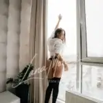 elite companion by window