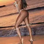 Bellie Elite escort London at sunset beach