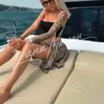 Tattooed model on yacht in Dubai