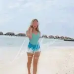 Stylish model on tropical beach