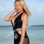 Stylish model posing by the sea