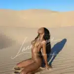 Golden bikini in desert sunset
